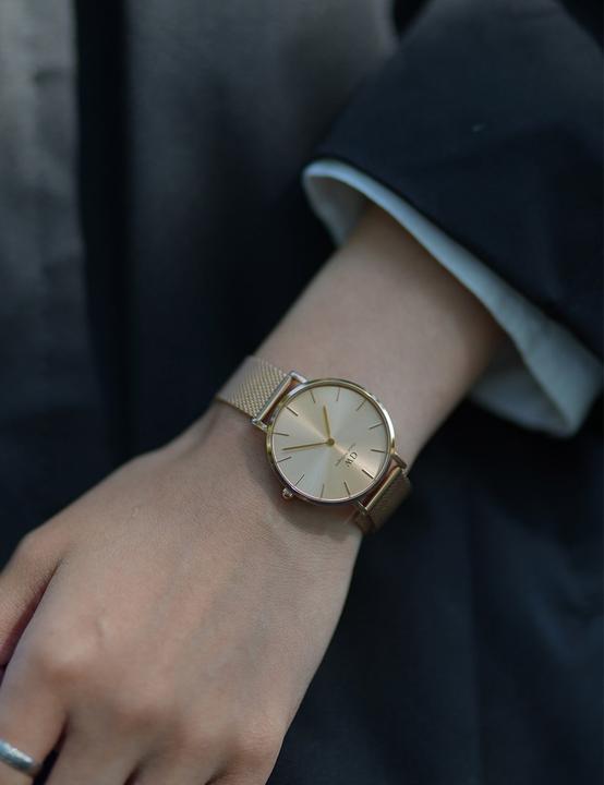Immagine prodotto Daniel Wellington Unitone classico Petite Oro (32 mm) (Orologio da polso analogico, 32 mm)