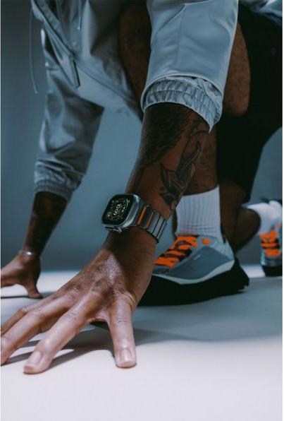 Productafbeelding Nomad Spartan Band Natural Titanium Ultra Orange 49mm (FKM, Titanium, Titanium)