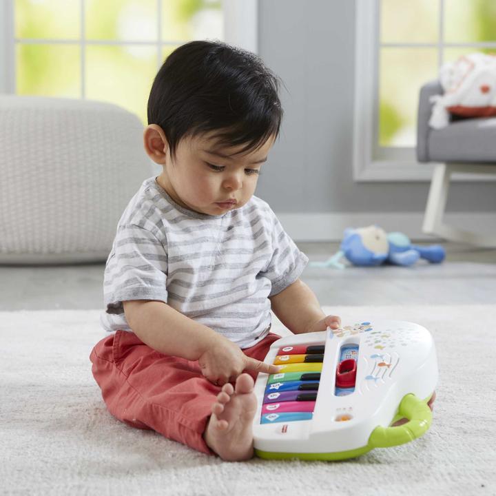Immagine prodotto Fisher-Price Pianoforte di Cagnolino Ridi & Impara Edizione Multilingue, Portatile con Luci, Versi d