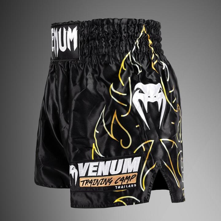 Immagine prodotto Venum Short Muay Thai VTC Flames – Nero/Oro – L (L)