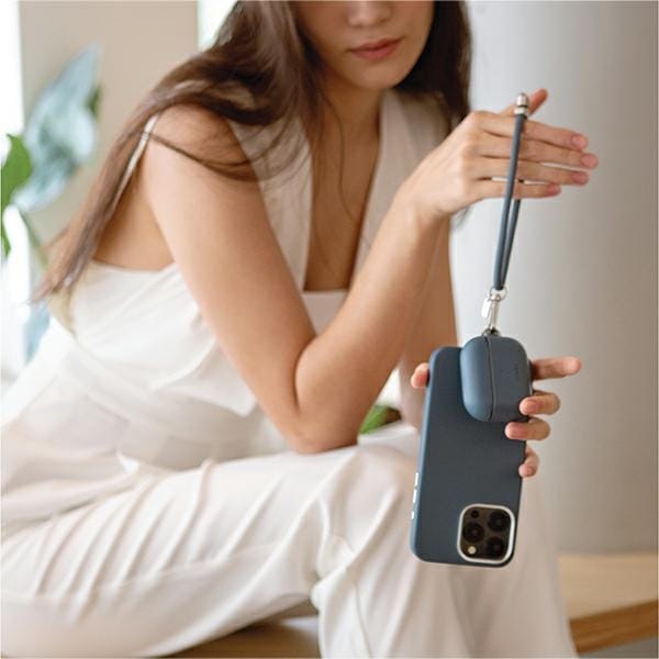Produktbild Uniq Coehl Laurel Handstrap uniwersalny sznurek do telefonu na rękę czarny/black
