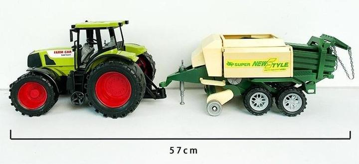 Traktor mit Ballenpresse