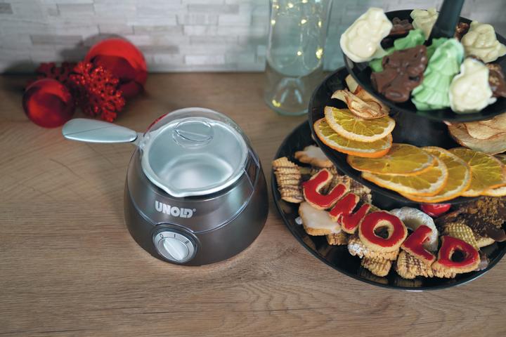 Produktbild Unold Chocolatier Weihnachtsedition 48967 (braun/silber, 25 Watt, 12 weihnachtliche Förmchen) (Schokoladenfondue)