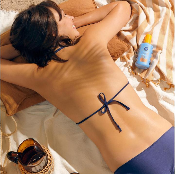 Immagine prodotto NIVEA Sun Schutz & Bräune (Spray solare, SPF 30, 200 ml, 227 g)