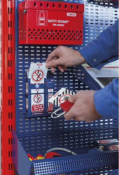 Actual product image Abus LOTO warning tag T100, small, in 100 piece dispenser, red.
