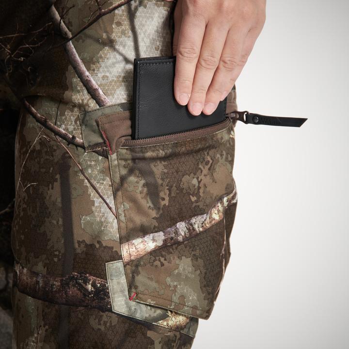 Image du produit Solognac Pantalon de pluie de chasse Treemetic 500 Femmes chaud imperméable silencieux Camouflage (40)
