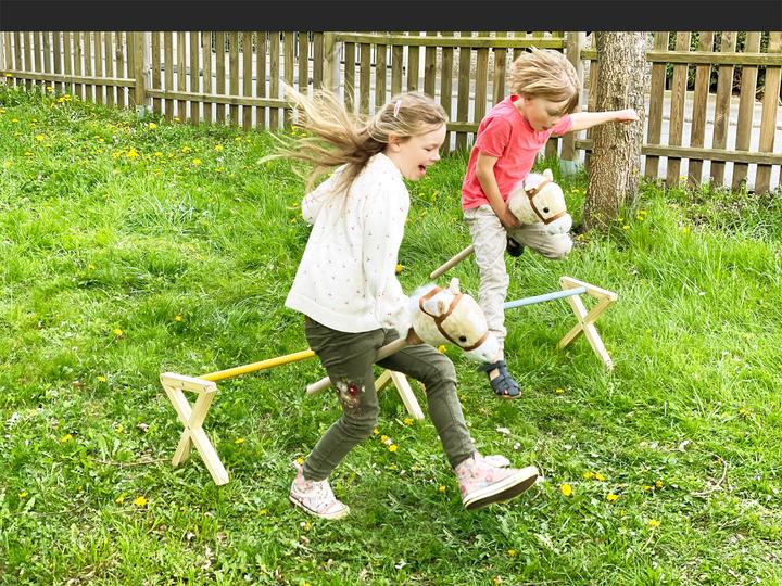 Actual product image small foot Cavaletti obstacle set for children (German, Spanish, French, Italian, English)