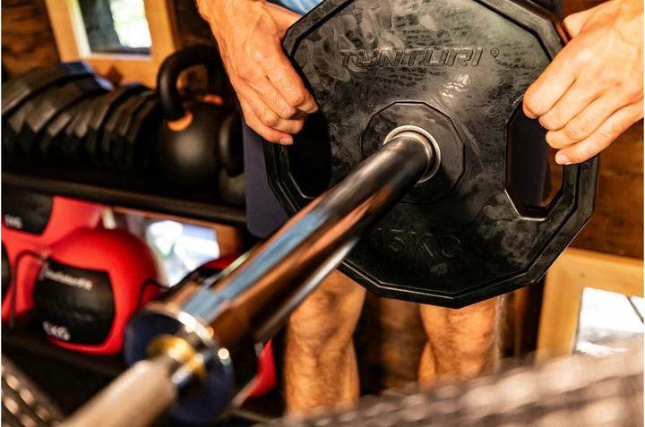 Produktbild Tunturi Gummierte 15 kg Hantelscheibe 50 mm (1 x 15 kg)