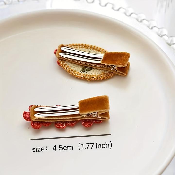 Image du produit Activity Board Gestrickte rote Blume Haarspange