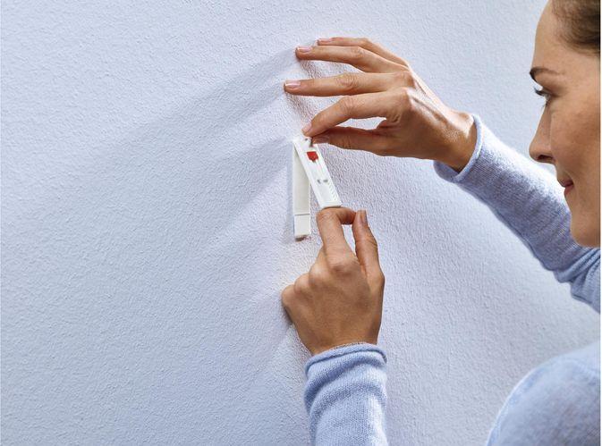 Actual product image tesa Adhesive nail wallpaper & plaster height adjustable