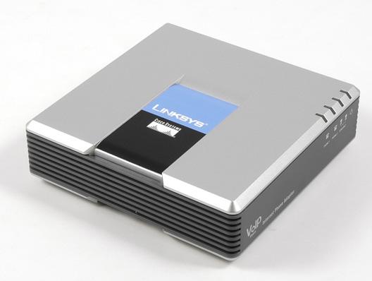 Actual product image Cisco PAP2T, telephone adapter for 2 analogue telephones to SIP