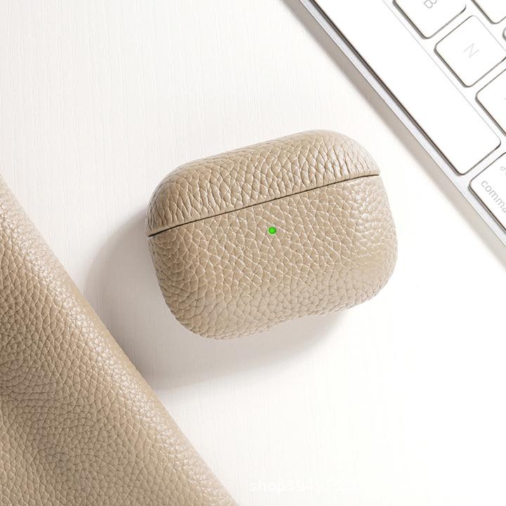 Actual product image PhoneLook Coque Étui de luxe absorbant les chocs en cuir véritable clair (Headphone bag)