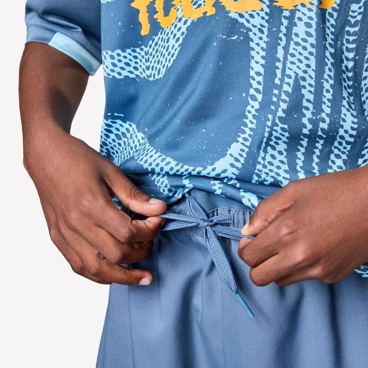 Produktbild Kipsta Kinder Fussball Shorts - VIRALTO Kids grau mit orangem Streifen