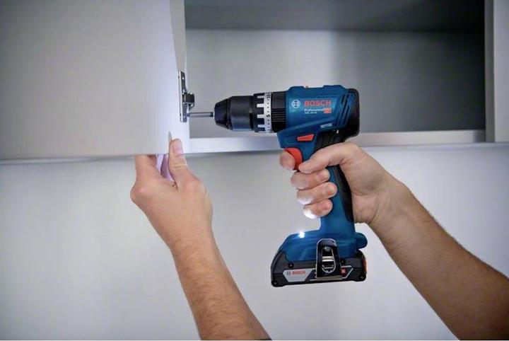 Produktbild Bosch Professional Combo Kit Set mit 3 18V-Werkzeugen: GSB 18V-45, GDX 18V-200, GWS 18V-7, 2x 5,0Ah