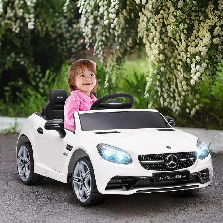 Image du produit Swisshandel24 Voiture électrique pour enfants, télécommande, ceinture de sécurité, musique, 3 ans et plus, blanc (12 V)