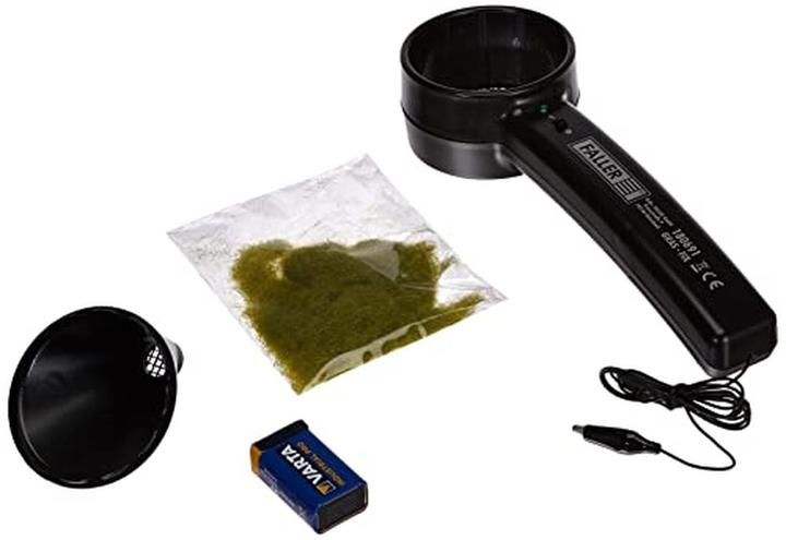 Image du produit Faller Les fibres herbeuses sont chargées électrostatiquement avec cet appareil. Une pose verticale des fib