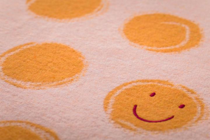 Actual product image David Fussenegger Babydecke Happy Faces mS orang (90 x 70 cm)