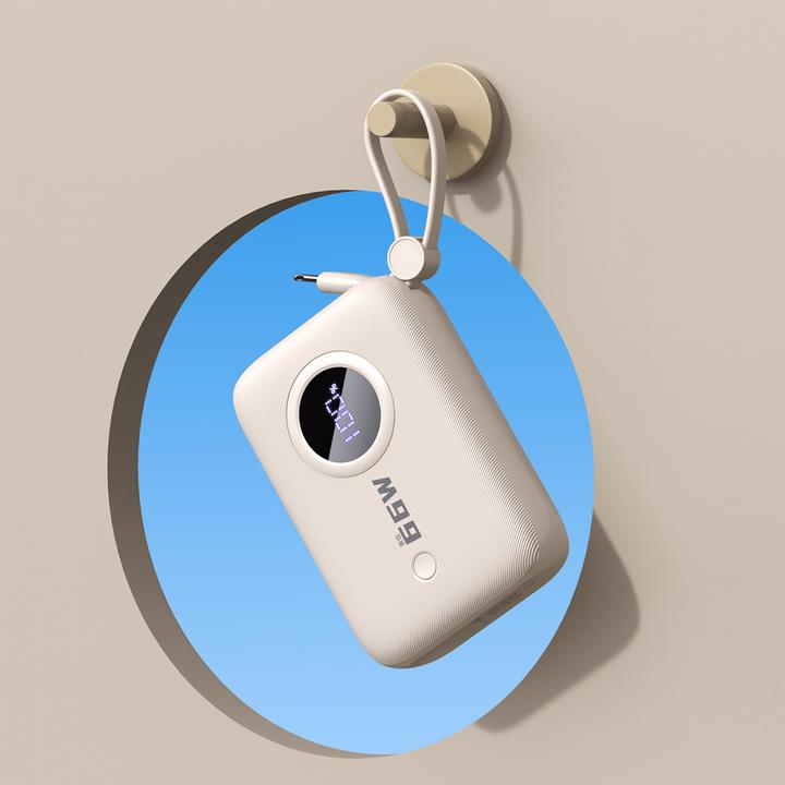 Actual product image Dudao K14 10000mAh power bank with USB-C / Lightning cables - beige (10000 mAh, 22.50 W, 37 Wh)