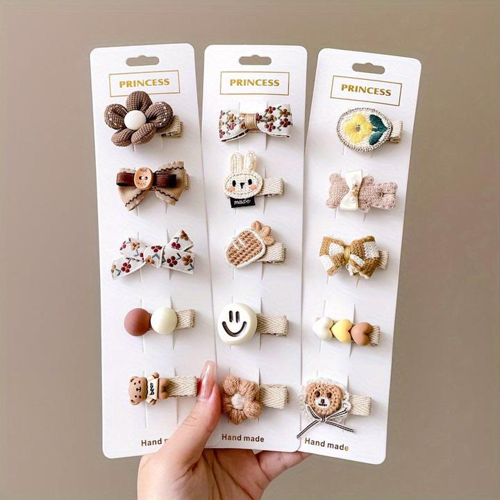 Activity Board 15/20pcs pinces à cheveux en forme d'animaux de dessins animés avec un visage souriant et un noeud (1 pcs)