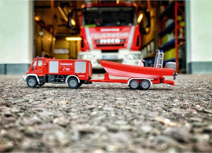 Produktbild Siku Unimog Feuerwehr mit Boot