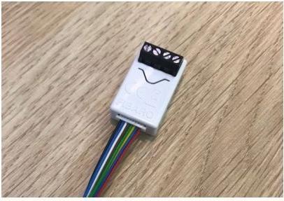 Actual product image Fibaro Smart Implant, with switching outputs (Switch actuator)