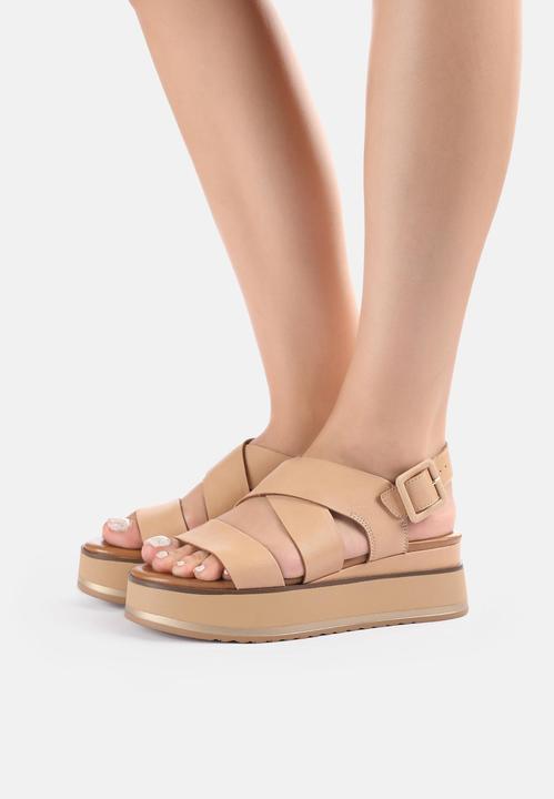 Immagine prodotto Inuovo Questo sandalo con zeppa di tendenza, realizzato in pelle di alta qualità, è il compagno perfetto (39)