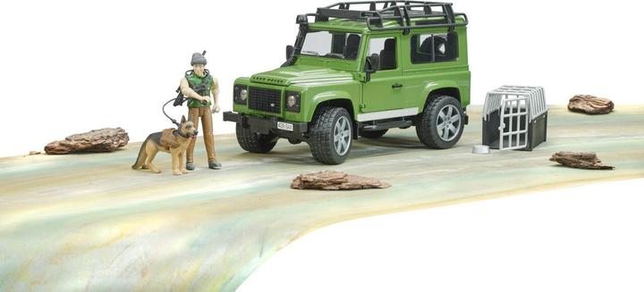 Immagine prodotto Bruder Land Rover Defender Station Wagon con guardia forestale e cane