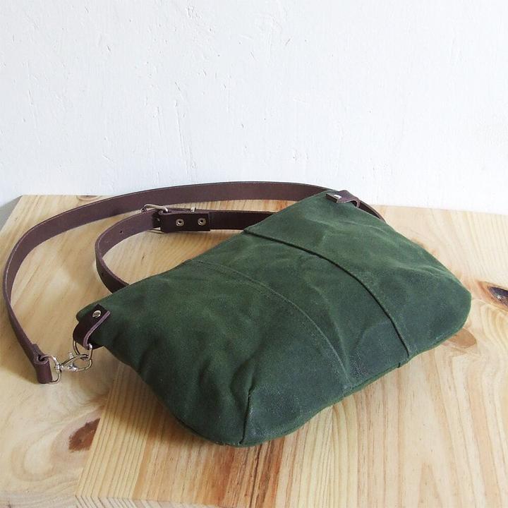 Immagine prodotto Only-Bags.Store Piccola borsa a tracolla in tela cerata verde con zip e tracolla in pelle