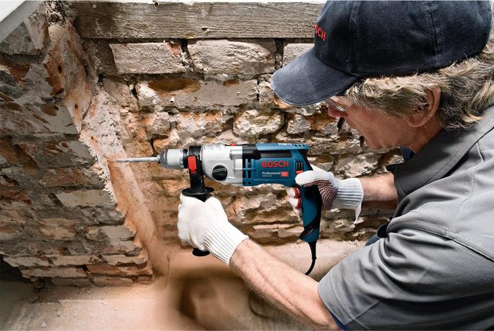 Immagine prodotto Bosch Professional Trapano a percussione GSB 24-2, con set di punte per legno da 7 pezzi, set di seghe a tazza (Corrente elettrica)
