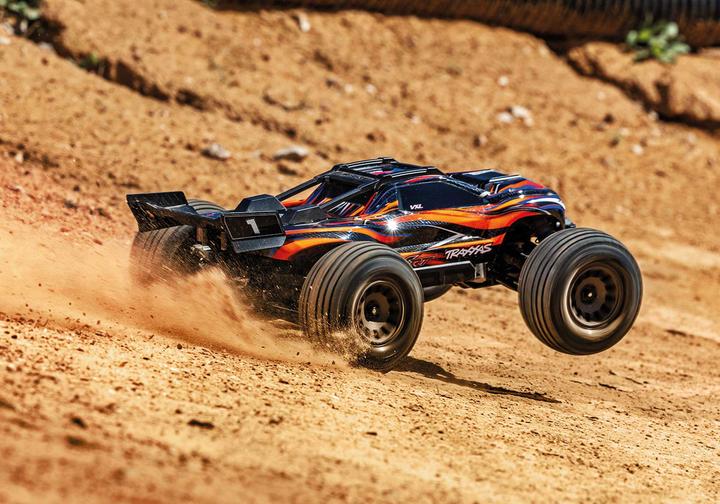 Produktbild Traxxas MINI-XRT Brushless VXL-3S 4WD Orange, inkl. 2S Akku/Lader (RTR Ready-to-Run)