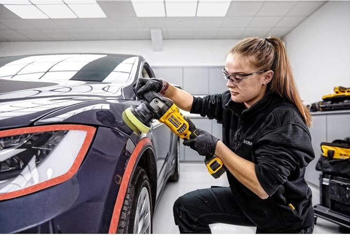 Produktbild DeWalt Pulesan-Maschine 18V, 125mm mit 2x5Ah Batterien