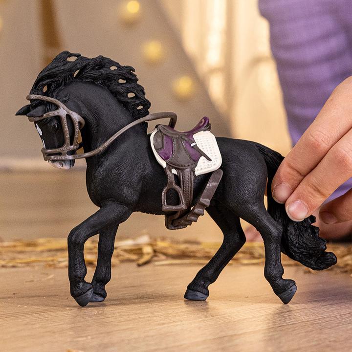 Actual product image Schleich Pura Raza Espanola stallion with saddle and bridle