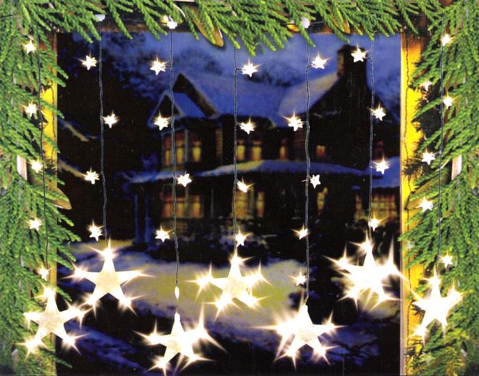 Produktbild Swisshandel24 LED Lichtervorhang Sternenvorhang Lichterkette Sterne Deko - 7 grosse, 32 kleine Sterne (1 m)