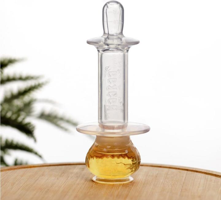 Actual product image Haakaa SqueezieDOSE Silicone Dispenser