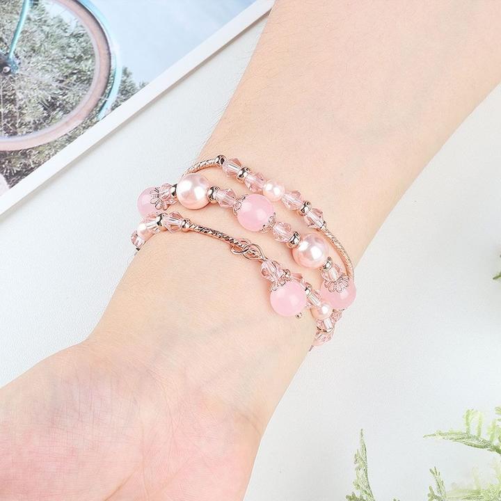 Produktbild Cover-Discount Fitbit Versa 4 / Sense 2 - Perlen Strass Armband rosa (Edelstahl, Versa)