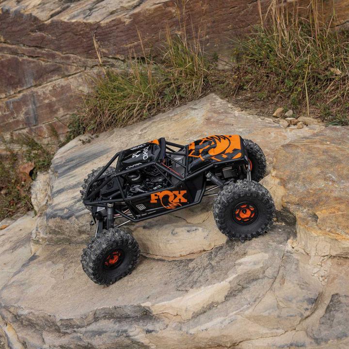 Image du produit Axial UTB10 Capra 1.9 1/10 4WS 4X4 RTR Brushed Rock Crawler, orange (RTR Prêt à fonctionner)