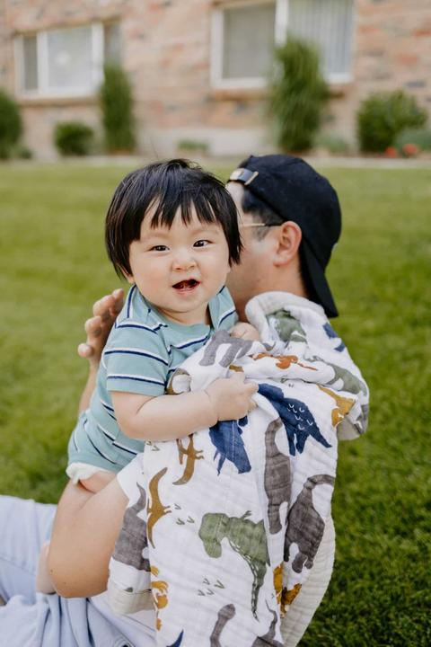 Actual product image little unicorn Cotton Muslin Baby Blanket - Dino Friends (120 x 120 cm)