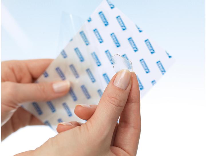 Actual product image tesa TACK double-sided adhesive pads, transparent adhesive strips