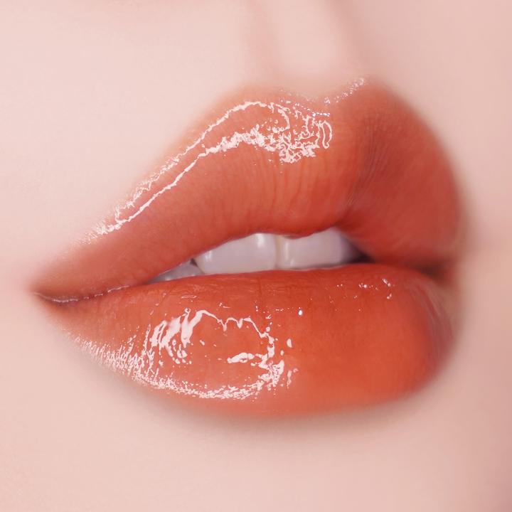 Actual product image Unleashia Sisua popcorn syrup lip plumper:no. 2 mango carame (Mango Caramel)