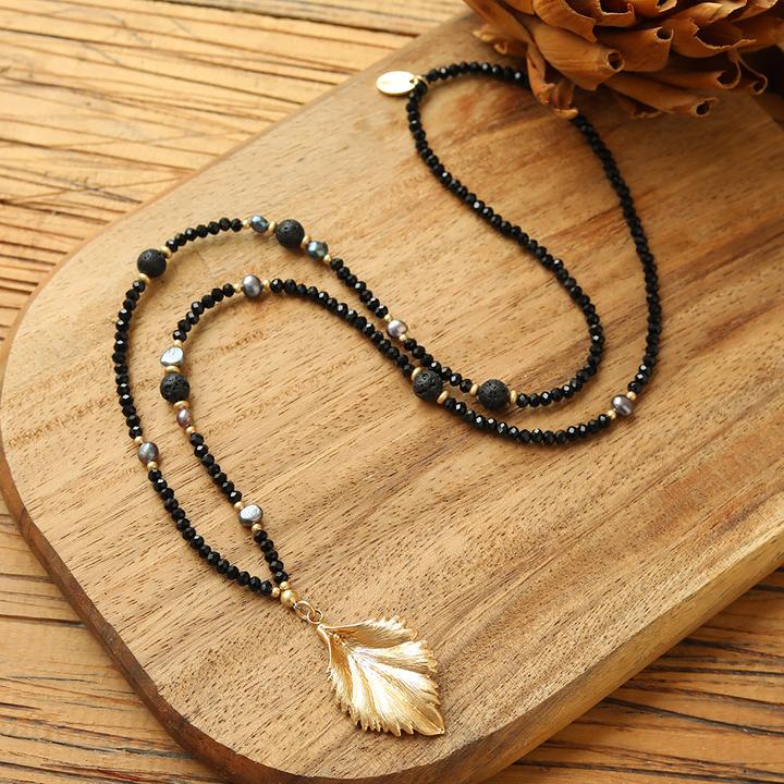 Image du produit Andreani Collier avec pendentif feuille en véritables perles noires d'eau douce avec verre (Perles)