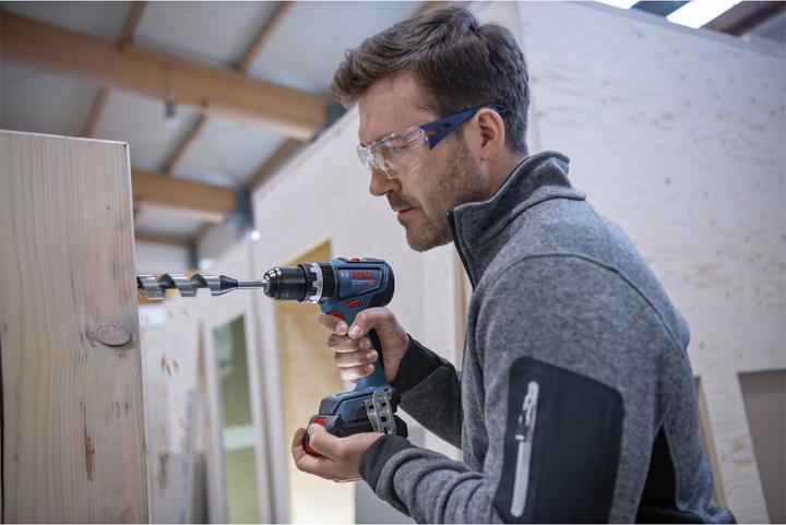Image du produit Bosch Professional Perceuse-visseuse à percussion sans fil GSB 18V-90 C (2x4.0Ah ProCore, GAL 18V-40, L) (Fonctionnement sur batterie)