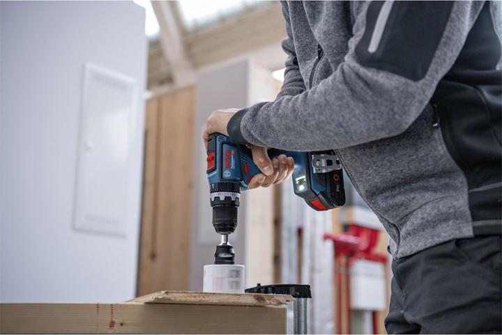 Image du produit Bosch Professional Perceuse-visseuse à percussion sans fil GSB 18V-90 C (2x4.0Ah ProCore, GAL 18V-40, L) (Fonctionnement sur batterie)