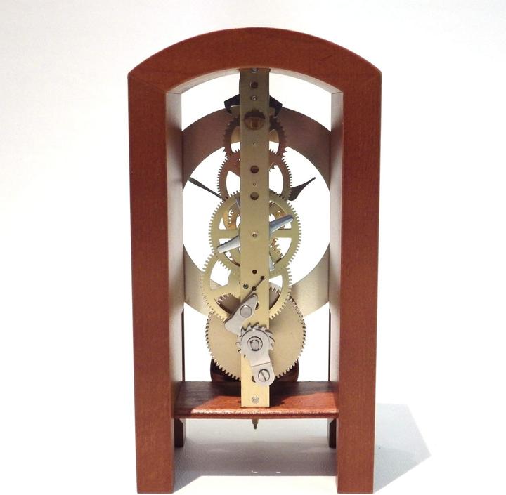 Actual product image Hermle Modern Skeleton Table Clock with Gold Pendel and Roman Numerals