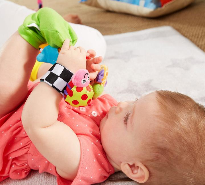 Actual product image Tomy Hand and foot rattle set