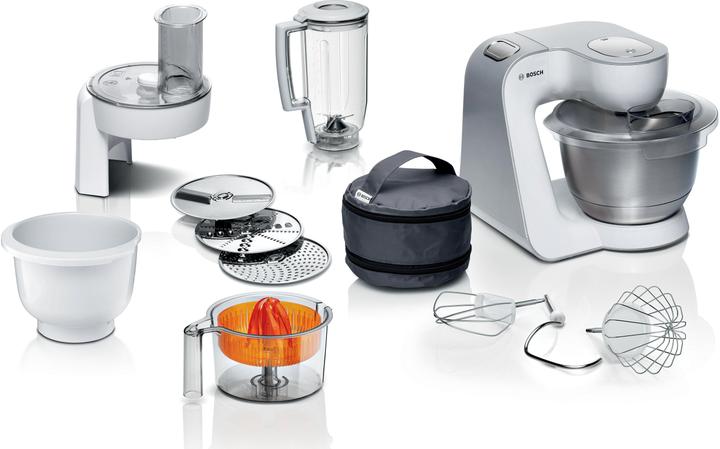 Schwingbesen, Knethaken, Saftpresse, Rührschüssel, Trommelraffel, Edelstahlschüssel, Deckel, Mixer-Aufsatz, Zubehörtasche, Rezept DVD, Reibscheibe, Schneidscheibe