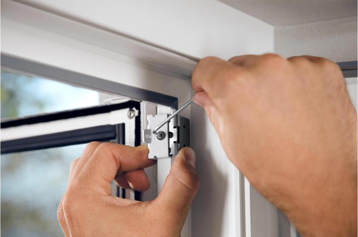 Actual product image tesa FALT insect screen adapter for doors, door clamp for mounting without drilling or screwing