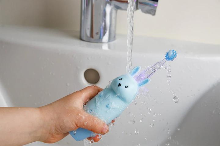 Image du produit Innogio GIOrconejo Brosse à dents électrique pour enfants avec 7 couleurs LED Poignée en silicone 4 modes