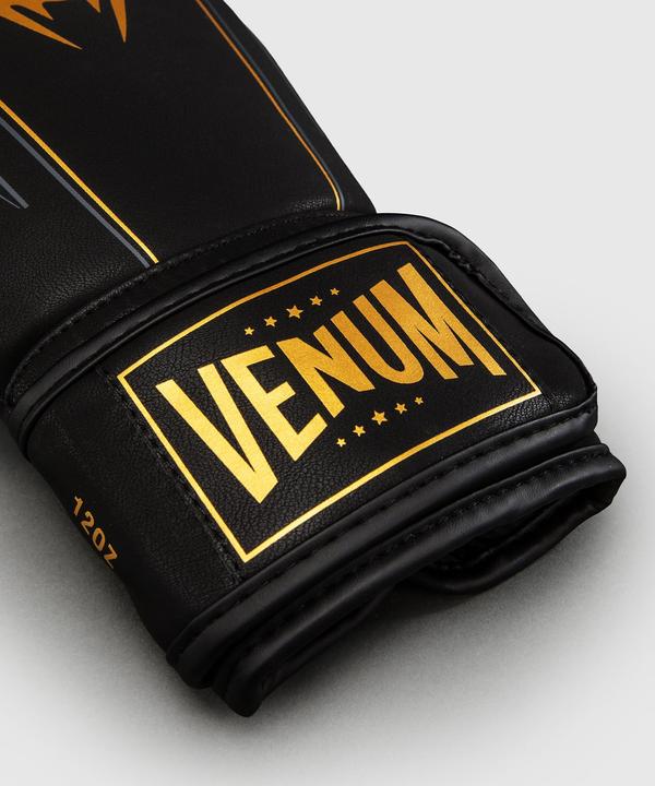 Produktbild Venum Streamline Boxhandschuhe Schwarz/Gold (16 OZ)