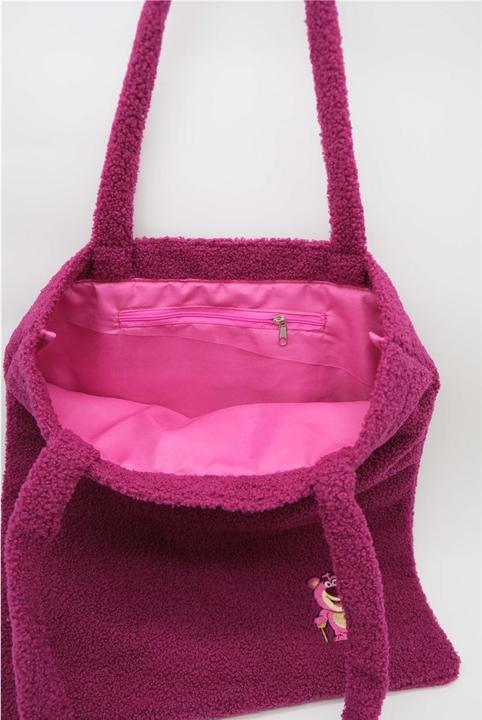 Produktbild Nomadict Teddy Lotso