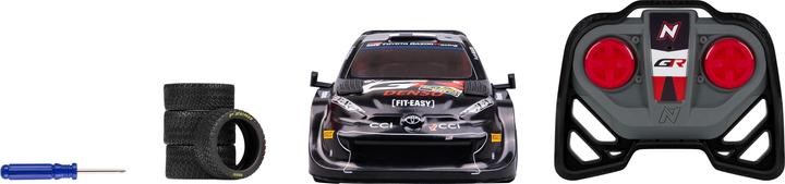 Actual product image Nikko Toyota Gazoo Racing Rovanperä Sweden Rally 2024 Remote Control Car with Extra Wheels, 1:16